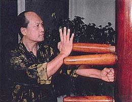 Sifu Tom Lo with Wing Chun Wooden Dummy